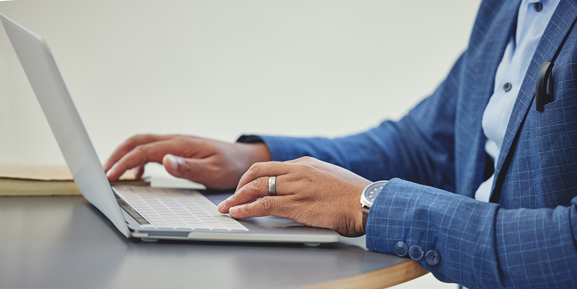 Financial Advisor typing notes