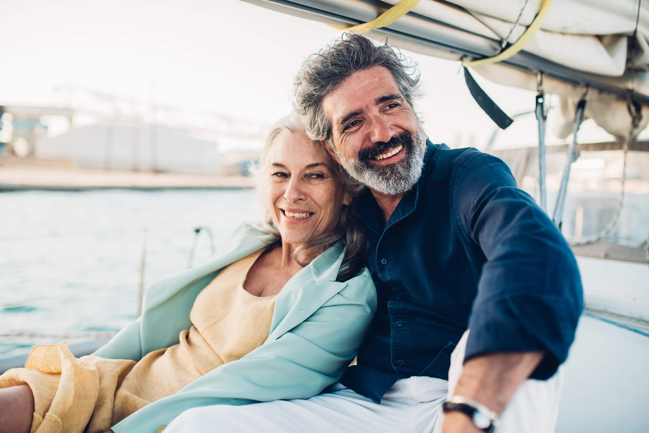 Man and Woman on Yacht Smiling